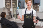 Hair Stylist wearing a BUTTERFLY apron from Trendy Salon Aprons