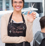 Hair Stylist wearing "The HAIR WHISPERER" apron from Trendy Salon Aprons