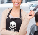 Hair Stylist wearing a GLITTERY SKULL apron smock from Trendy Salon Aprons