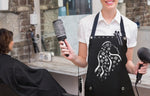 Hair Stylist wearing HAIR GODDESS apron from Trendy Salon Aprons